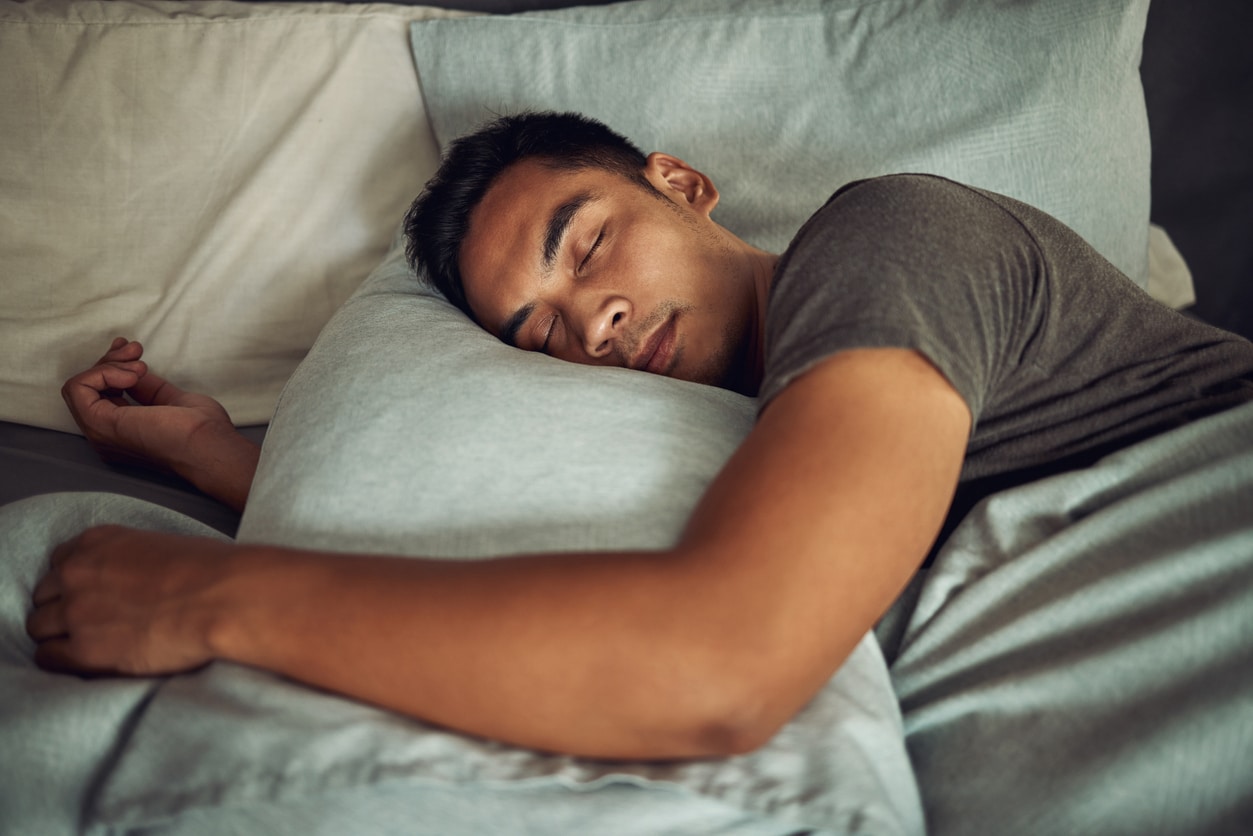 Young man sleeping comfortably.