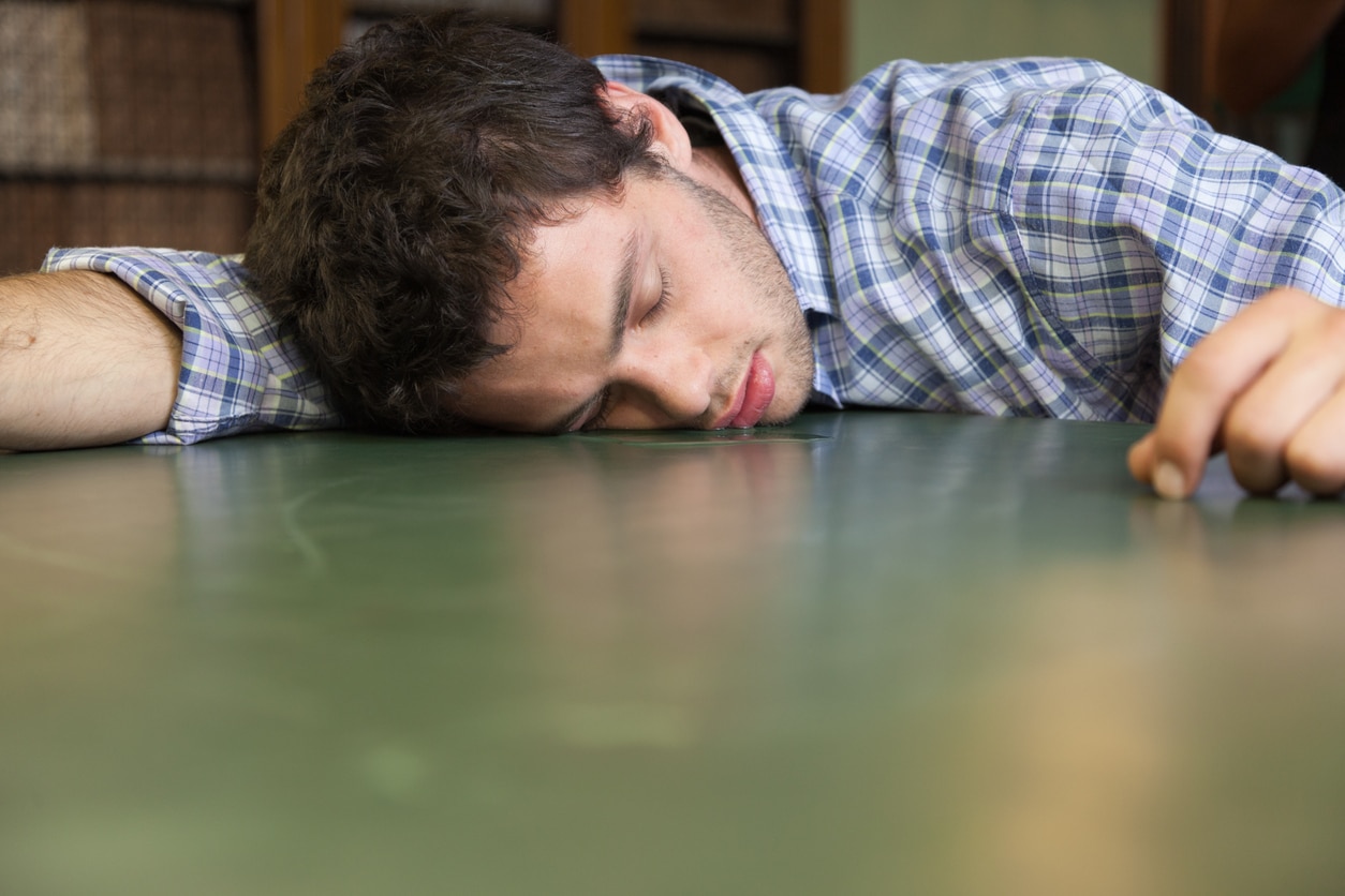 Student drooling on a desk